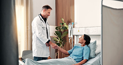 Buy stock photo Doctor, woman and bed at hospital with handshake, welcome and thank you for organ transplant. Surgeon, mature people and shaking hands in clinic with smile, donor gratitude and success of treatment