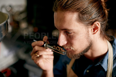 Buy stock photo Man, barista and smelling beans in coffee shop, small business and server with ingredients for beverage. Quality assurance, employee and person with caffeine in cafe, grains and inspection of seeds
