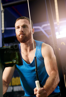 Buy stock photo Strong, man and suspension machine in gym for body, wellness and bodybuilding exercise. Biceps, cardio and male athlete in training challenge with cable equipment for muscle power, workout or fitness