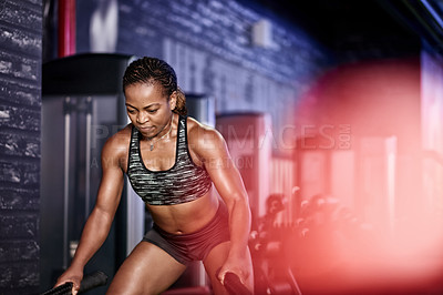 Buy stock photo Gym, fitness or black woman with battle rope for muscle growth, strength development or power. Equipment, endurance and African bodybuilder with resilience in workout, exercise challenge and club