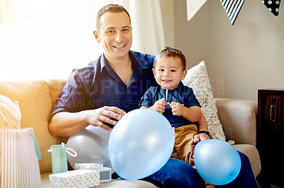 Buy stock photo Father, son and portrait with party for birthday, childhood or bonding on sofa in home. Dad, child and smile for celebration, love and fun in living room of house for event together with presents