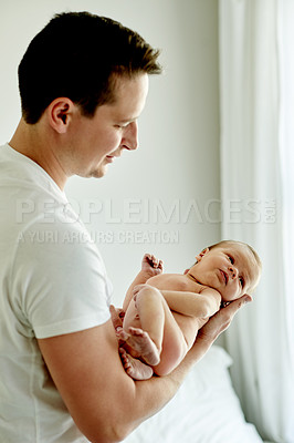 Buy stock photo Family, cute and father holding baby in home for love, bonding time and sweet moment together. Connection, child and dad with newborn kid for care, support or affection in parenthood at house.