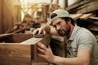 Buy stock photo Carpentry, man and sandpaper on wood in workshop for production, manufacturing and furniture. Carpenter, woodwork and sanding for smooth process, craft and joinery in industrial factory with tools