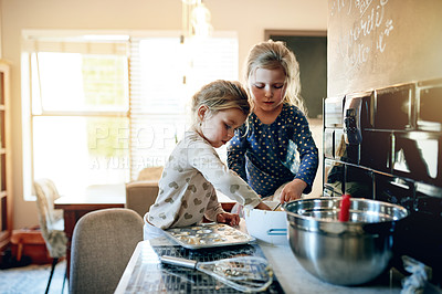 Buy stock photo Baking, activity and kids in kitchen in home for bonding, connection or learning on weekend. Happy, mixing bowl and girl children with preparing dough for cookies, biscuits or dessert together.
