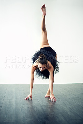 Buy stock photo Balance, elegant or woman in studio for ballerina practice, creative dancing or training. Wall, white background or flexible dancer in routine with grace, space or talent for exercise, body or ballet