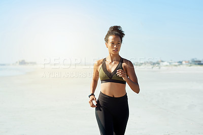 Buy stock photo Blue sky, exercise and running with woman on beach for cardio training or morning workout. Fitness, health and wellness with African athlete or runner on space outdoor for challenge or improvement