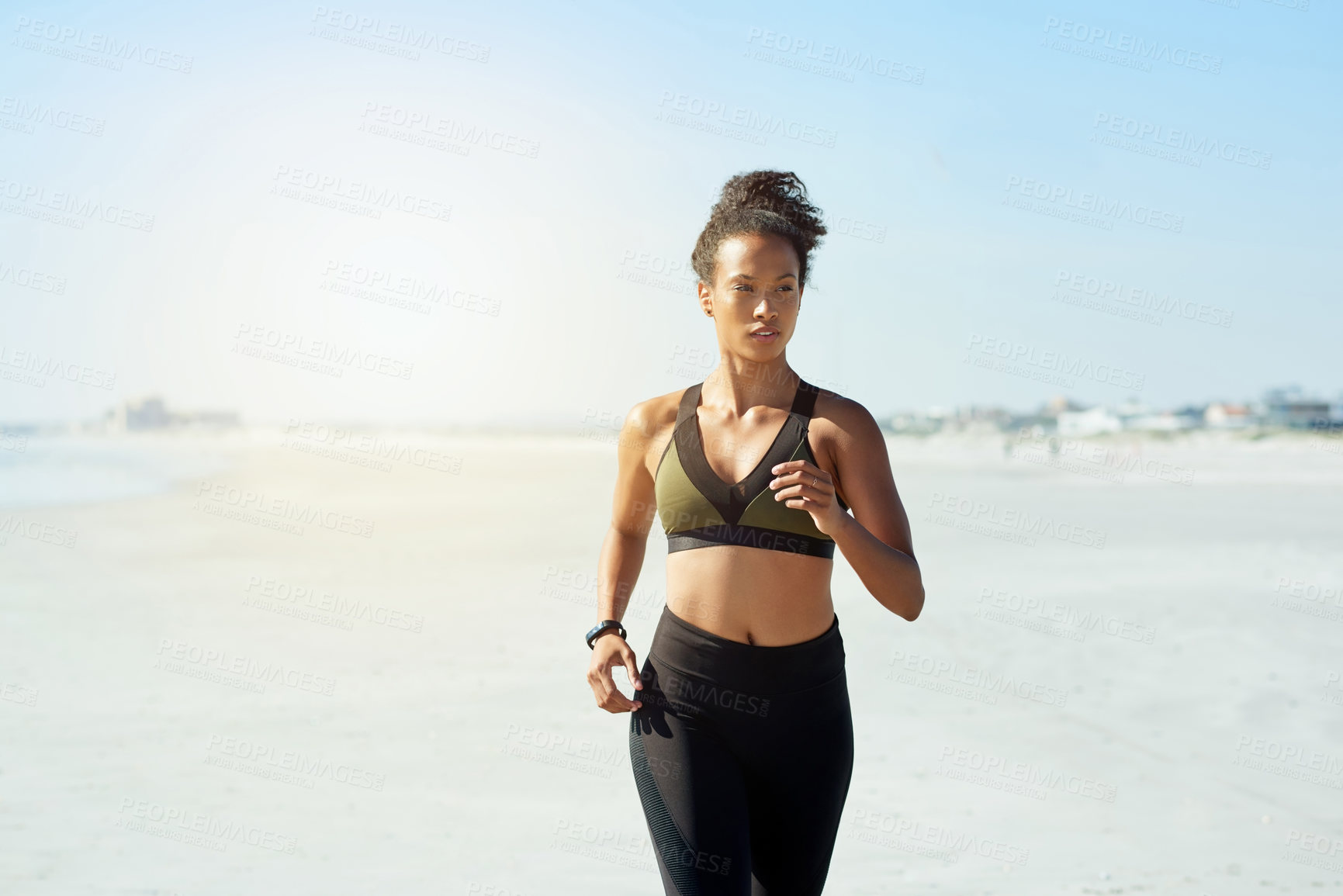 Buy stock photo Blue sky, exercise and running with woman on beach for cardio training or morning workout. Fitness, health and wellness with African athlete or runner on space outdoor for challenge or improvement