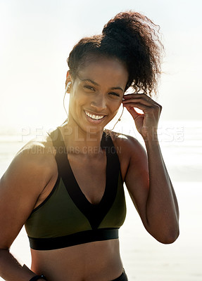 Buy stock photo Earphones, exercise and portrait of woman on beach for start of cardio training or workout in summer. Fitness, flare and smile of African athlete or runner streaming music outdoor for health session