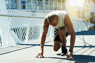 Buy stock photo Athlete, black man and start race in city for exercise, cardio training and competition. Male person, ready and preparation for running challenge, sports workout and marathon practice for wellness