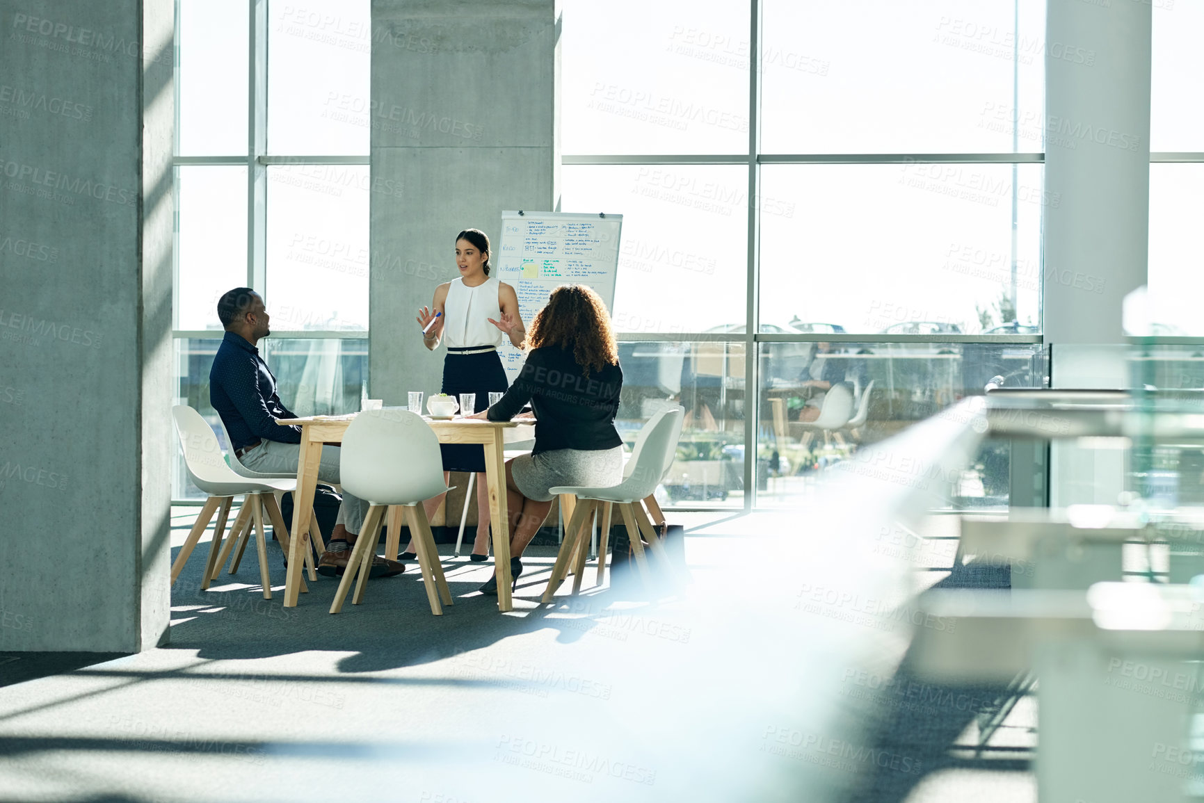 Buy stock photo Presentation, report and speaker with business people in office for discussion, planning and project management. Collaboration, teamwork and woman with whiteboard for brainstorming, meeting or review