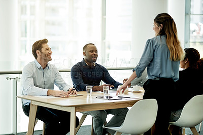 Buy stock photo Business, woman and meeting with staff in office for discussion, planning and headline ideas. Manager, talking and team listening for article feedback, brainstorming and proposal for online magazine