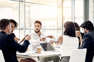 Buy stock photo Meeting, business people and handout paperwork for discussion, policy and idea proposal. Planning, collaboration and giving document to group for compliance review, strategy and feedback in office
