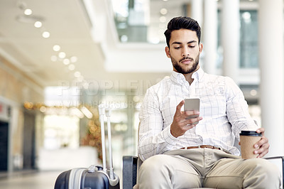 Buy stock photo Travel, coffee and businessman with phone at airport for notification, schedule or online booking. Flight, mobile and employee waiting at lobby with drink for journey, immigration and trip with bokeh