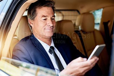 Buy stock photo Phone, smile and businessman in car with communication, networking or email online for career. Window, happy and male corporate manager with contact on app with cellphone in vehicle for transport.