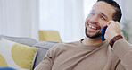 Happy, man and relax in living room with phone call, good mood and listen to story on weekend break. Person, smile and hearing feedback in home with mobile tech, contact and internet connectivity.