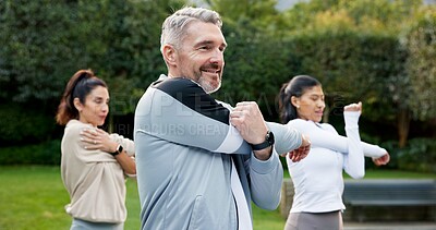 Buy stock photo Man, stretching and personal trainer outdoor with fitness class, smile and preparation for workout. Mature person, exercise coach and happy with warm up for training, vitality and wellness in garden.