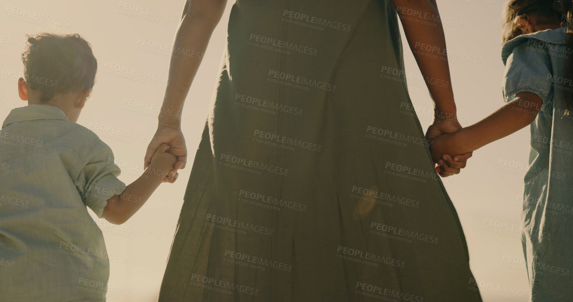 Buy stock photo Holding hands, love and mother with children in nature for support, connection and family holiday. Trust, commitment and security with woman and kids walking outdoor for journey, growth and safety 