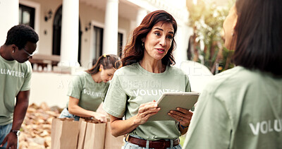 Buy stock photo Smile, woman and tablet outdoor for volunteering, sign up and appoint task for community outreach. Happy, coordinator and people with digital for charity, participation and job allocation for welfare