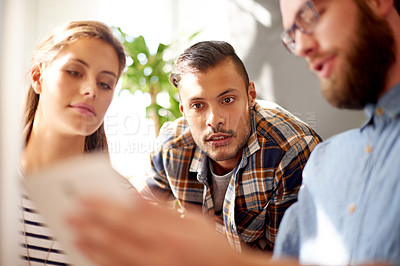 Buy stock photo Creative, group and people on tablet in meeting for planning, research and training for website development. Staff, mentor and digital with team brainstorming, software update and programming project