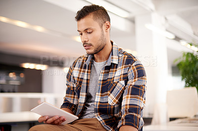 Buy stock photo Remote work, search and tablet with man in home for browsing internet or social media. App, break and reading with freelance entrepreneur in apartment for blogging, information or web development
