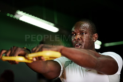 Buy stock photo Sweating, man and weight plate in gym for intense workout, muscle growth and functional strength. Fitness, night and black person with equipment for resistance challenge, power training or resilience