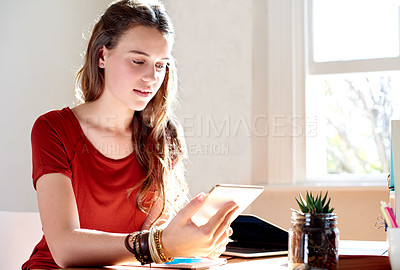 Buy stock photo Education, learning and tablet with teen girl in study of home for college or university assignment. App, search and scholarship with student in campus apartment for development or online research