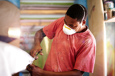 Buy stock photo Mask, PPE and black man with surfboard, scissor and creative for skills, talent and hobby. Craftsman, artist and entrepreneur with workshop for design, manufacturing and custom work for artisan craft