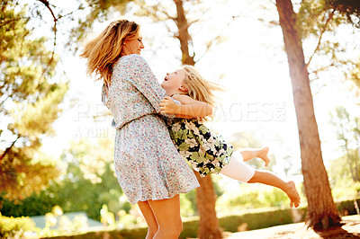Buy stock photo Smile, mother and spinning kid at park for fun, playful games and bonding together on holiday. Happy, woman and swinging child with energy, activity and coordination with balance for vacation outdoor