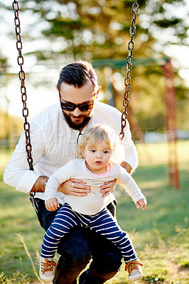 Buy stock photo Nature, swings and dad with child in park for holiday, weekend or vacation together. Smile, trees and girl kid with father for playing outdoor on playground for connection in summer in backyard.