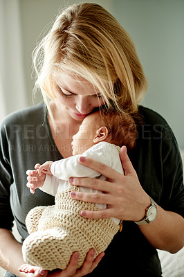 Buy stock photo Mother, baby and love in home with affection, bonding or relationship growth for care in family. Woman, infant with holding or hug for connection in house, tender moment with new mom and motherhood