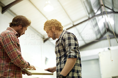 Buy stock photo Carpentry, workshop and men with plank for woodwork, furniture restoration and teamwork. DIY project, factory and contractor advice in discussion for meeting with timber, lumber or manufacturing
