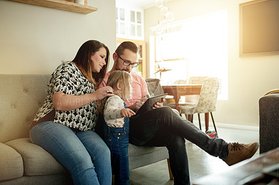 Buy stock photo Family, parents and child on sofa with tablet for playing games, streaming cartoon and bonding. Pregnant mother, father and daughter in home with tech for digital app, watching video or internet.