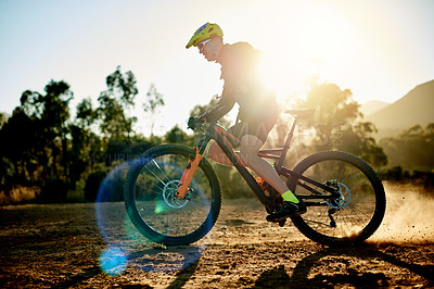 Buy stock photo Bike, helmet and off road with man in mountains for outdoor exercise, fitness or hobby. Cycling, flare and trail riding with cyclist person in nature for challenge, performance or sports training
