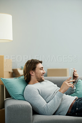 Buy stock photo Online, moving and man with tablet, home and research for renovation of apartment, info and website. Relocation, boxes and person with tech for house improvement, space or browse for interior design