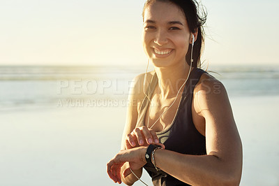 Buy stock photo Smart watch, fitness and portrait of woman at beach with exercise music, heart rate and smile at sunset. Face, wristwatch or sports athlete outdoor for steps, workout results or pulse for body health