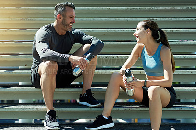 Buy stock photo Laughing, fitness and couple on break, steps and happy for exercise in morning, summer and healthy. Outdoor, rest and people with sportswear for workout, training and smile with routine for wellness