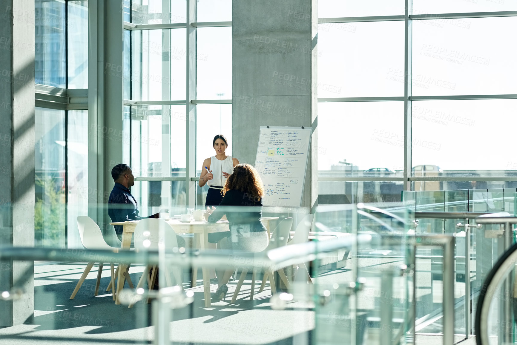 Buy stock photo Presentation, meeting and speaker with business people in office for discussion, planning and project management. Collaboration, teamwork and woman with whiteboard for brainstorming, report or review
