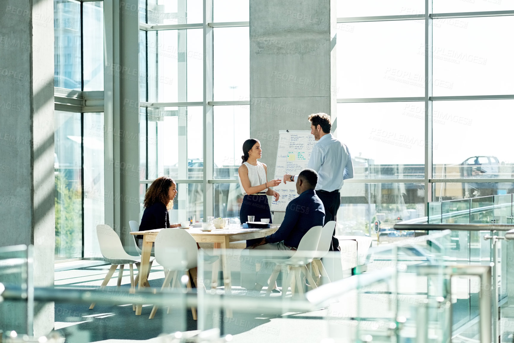 Buy stock photo Collaboration, meeting and speaker with business people in office for discussion, planning and project management. Presentation, teamwork and woman with whiteboard for brainstorming, report or review