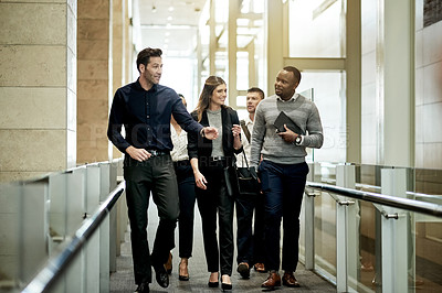 Buy stock photo Walking, team and talk with business people in hotel for meeting, conference expo and partnership. Discussion, collaboration and seminar event with employees on bridge of convention center for trip