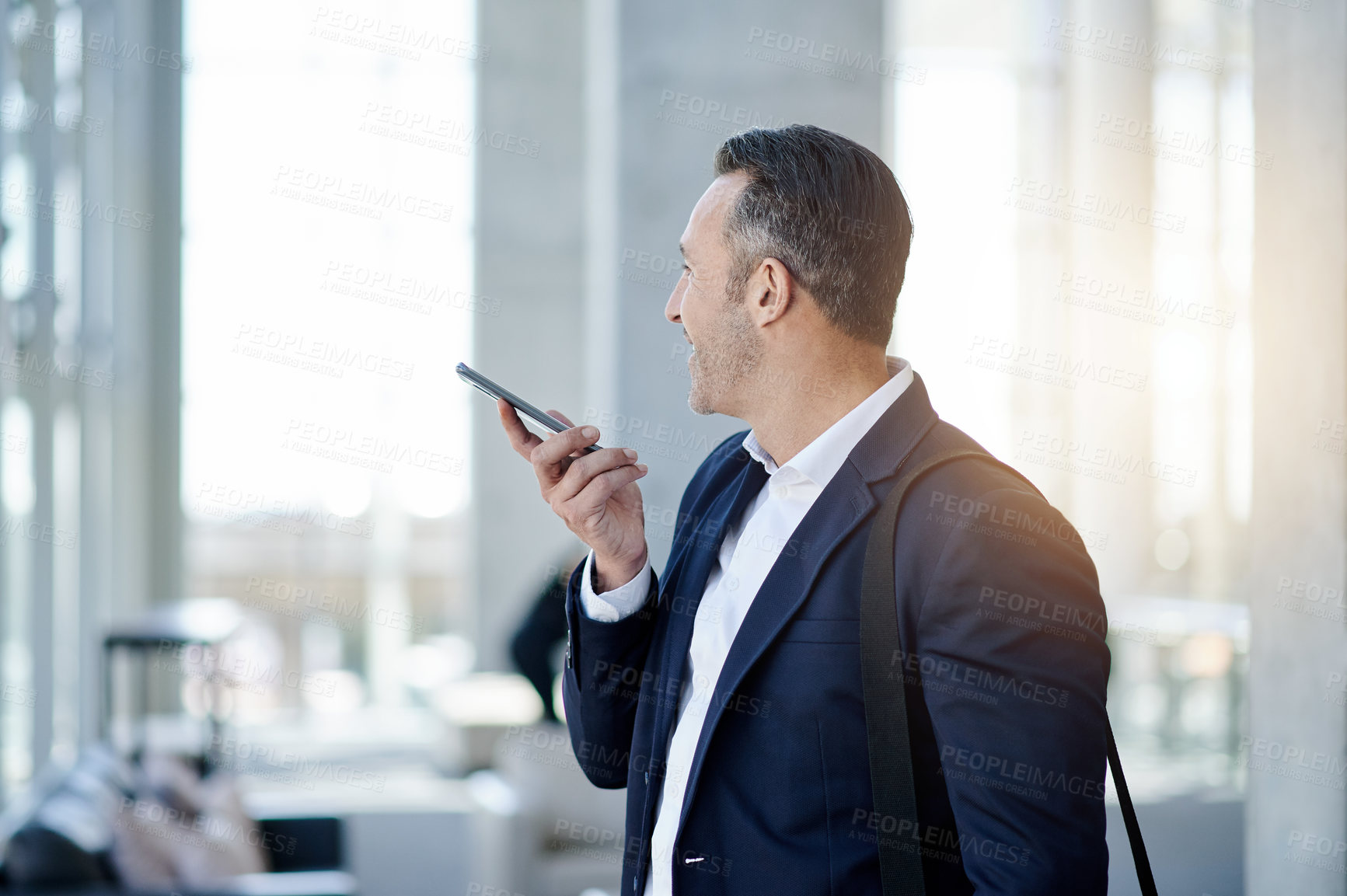 Buy stock photo Business man, speaker and phone with travel at airport for international conference, summit or schedule flare. Corporate trip, voice memo and mobile app for flight or booking for global convention