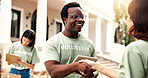 Donation, volunteer or happy man with handshake for charity, checklist or fundraiser campaign. Male person, activist or shaking hands with smile for community service or outdoor outreach together