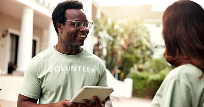 Buy stock photo Smile, man and tablet outdoor for volunteering, sign up and appoint tasks for community outreach. Happy, coordinator and people with digital for charity, participation and job allocation for welfare