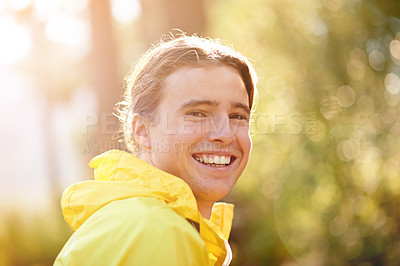 Buy stock photo Portrait, runner and man in forest, smile and training with challenge, wellness and energy. Person, outdoor and athlete in woods, happiness and exercise with practice, nature and cardio with fitness