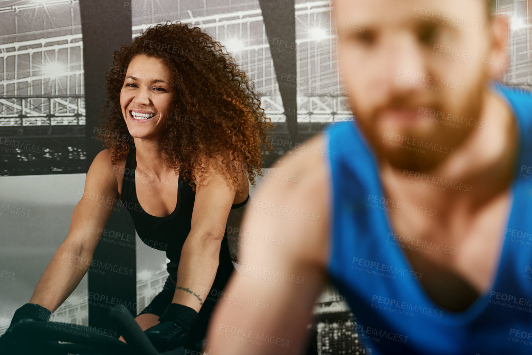 Buy stock photo Laugh, spin class or happy woman on cycling bike in training and exercise for wellness, health or fitness. Funny, smile or person on bicycle machine for workout, body or challenge in gym community