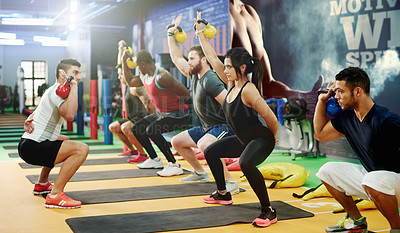 Buy stock photo Kettlebell, coaching and workout with people at gym for bodybuilder bootcamp, training and fitness. Personal trainer, weightlifting and exercise class with group of athletes in sports club for health