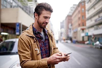 Buy stock photo Phone, street or travel and man in city with app for cab or taxi booking as commuting tourist. Communication, social media and text message with person outdoor in urban town for transport service