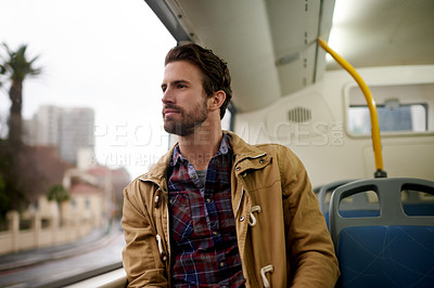 Buy stock photo Travel, sightseeing and man in train, window and thinking of journey in public transport, morning and serious. Commuting, traveller and person with view of city, tourist and peaceful trip in vehicle