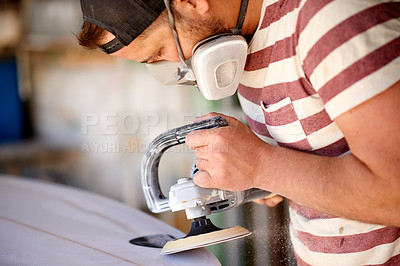 Buy stock photo Sanding, man and project in workshop for manufacturing, restoration or surfboard tools. Production, machine or creative wooden craft in small business for surfing equipment and renovation process