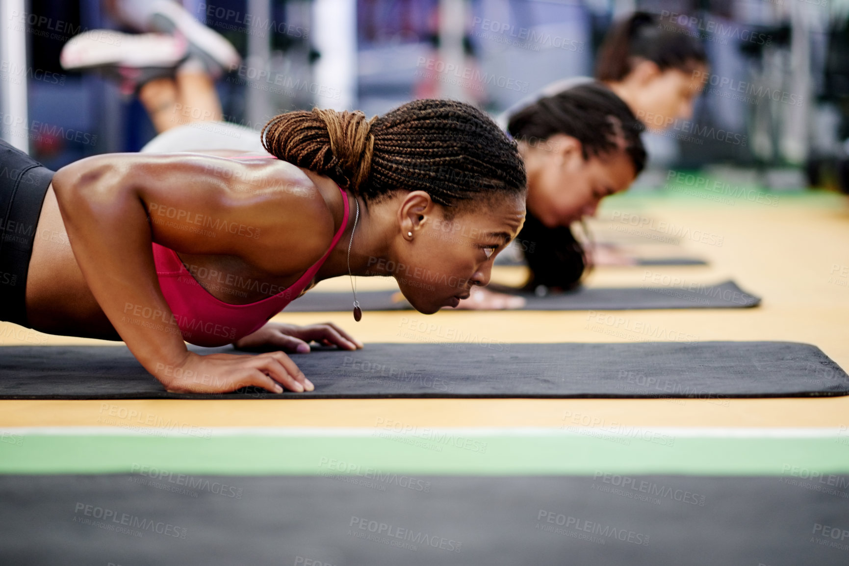 Buy stock photo Fitness, women and push up in gym class for collaboration, arm muscle development or exercise group. Bodybuilder, workout and personal trainer with team for strength, commitment or sport activity