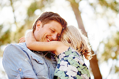 Buy stock photo Dad, smile and hug child in nature for love, care and bonding together for connection on holiday. Father, carry girl and embrace kid at park for support, trust and happy parent on family vacation